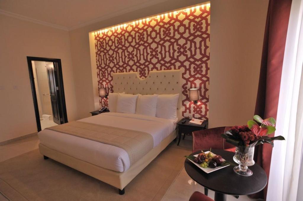 Il Palazzo Hotel And Suites Amán Habitación foto